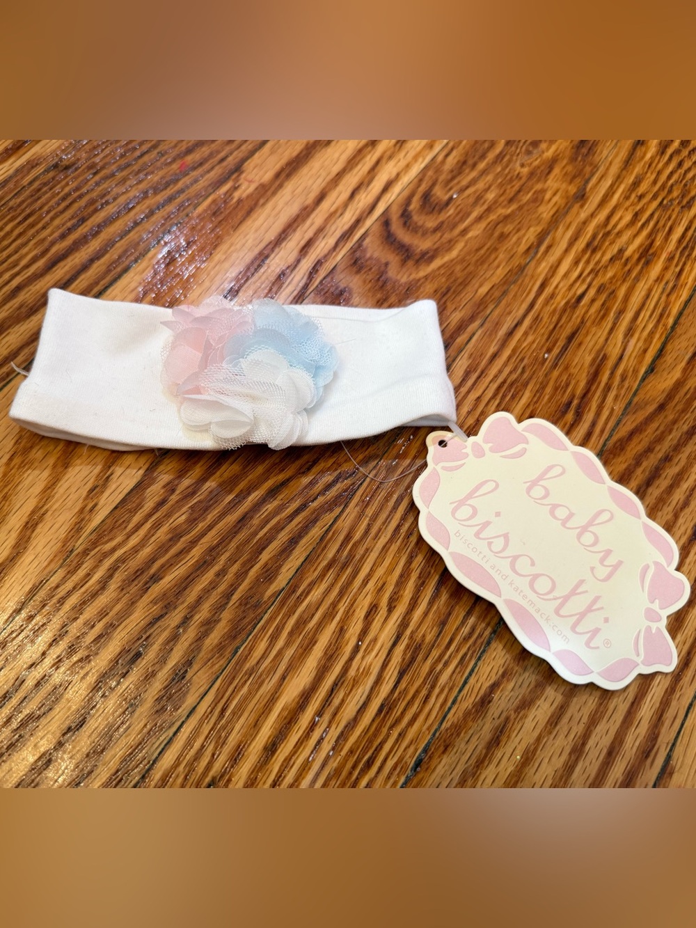 Biscotti White Baby Headband with Pastel Pink & Blue Flower